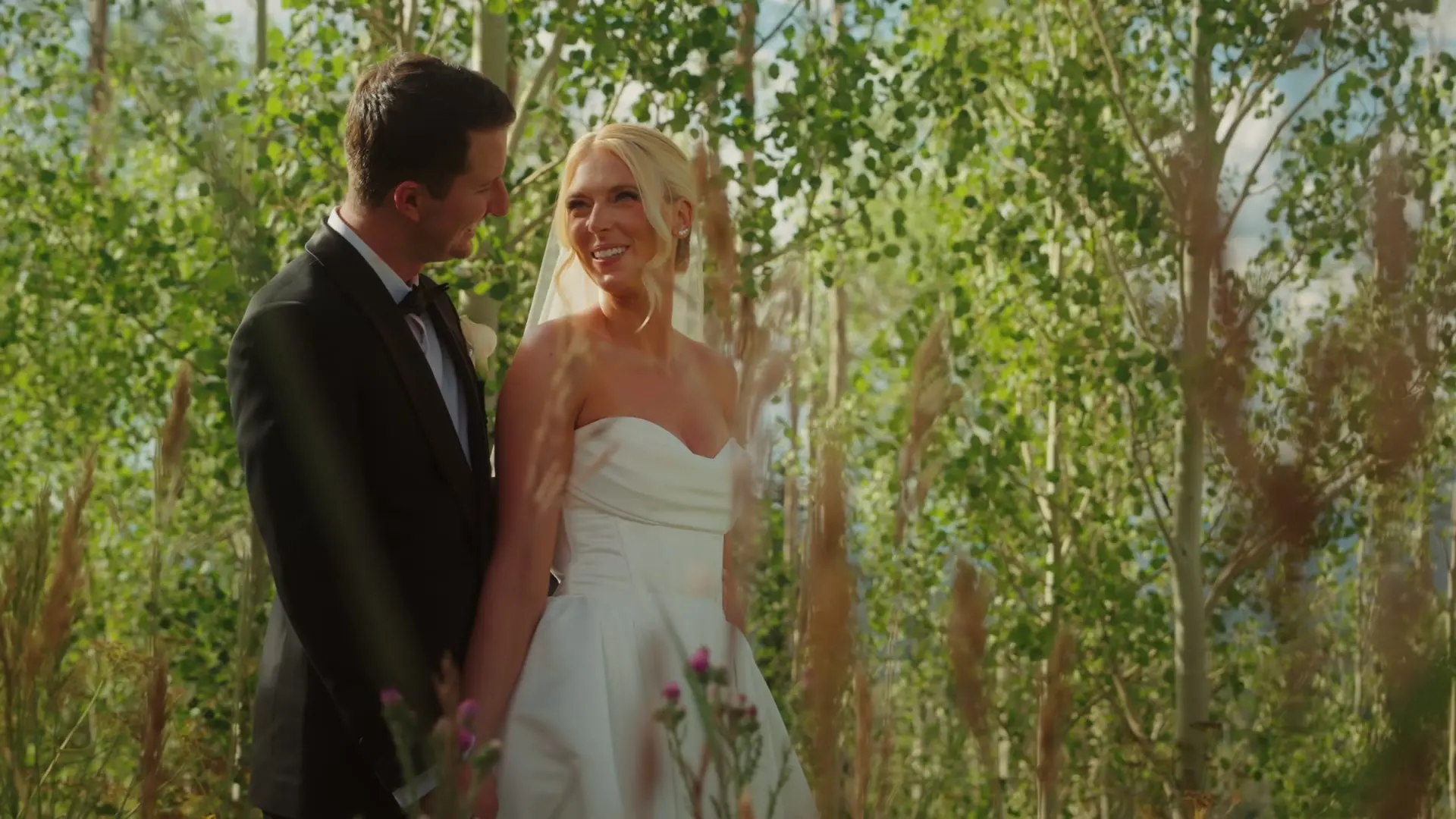 Brooklyn and Michael smiling during wedding portraits in Snowmass, Colorado