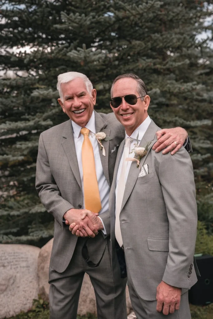 Groomsmen reacting during Aspen wedding ceremony