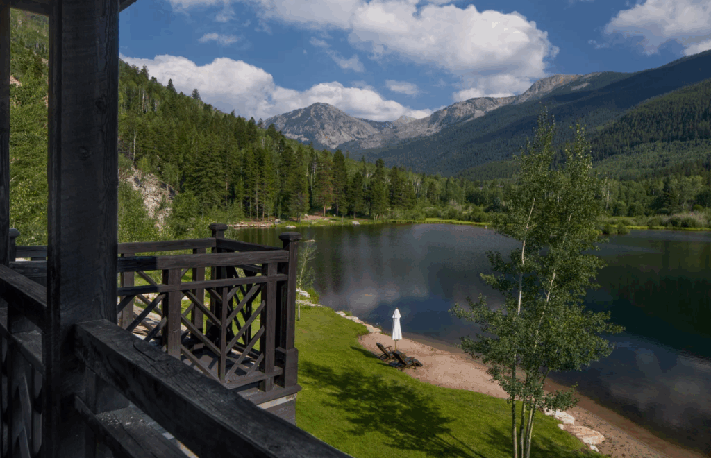 Scenic view of Dunbar Ranch and the mountain peaks and body of water surrounding it.