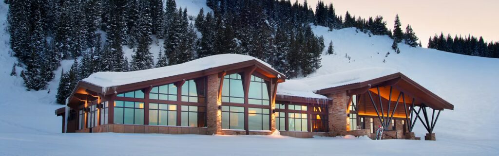 Modern mountain wedding venue at The 10th in Vail, Colorado, featuring alpine lodge architecture, elegant dining spaces, and panoramic ski slope views.