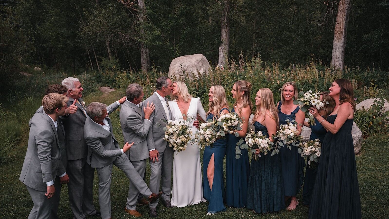 Modern photo booth alternative at an Aspen wedding — roaming photographer capturing natural guest moments with instant delivery