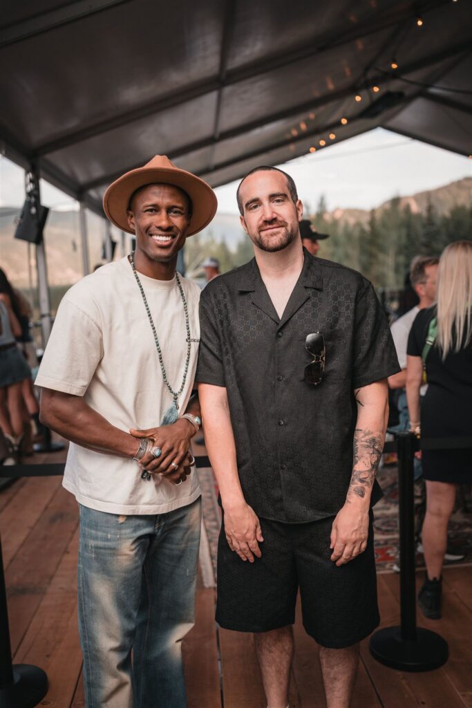 Group of concert attendees receiving instant prints through Aspen event instant photo sharing