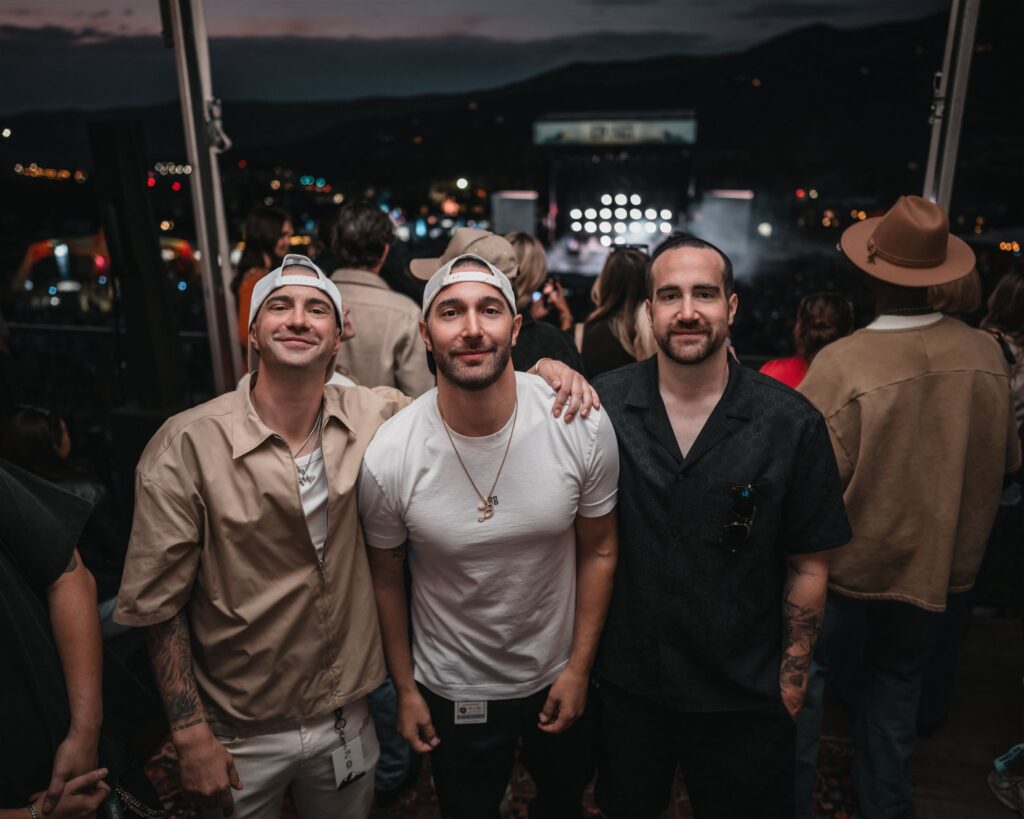 Aspen event instant photo sharing at a live concert with fans capturing the moment