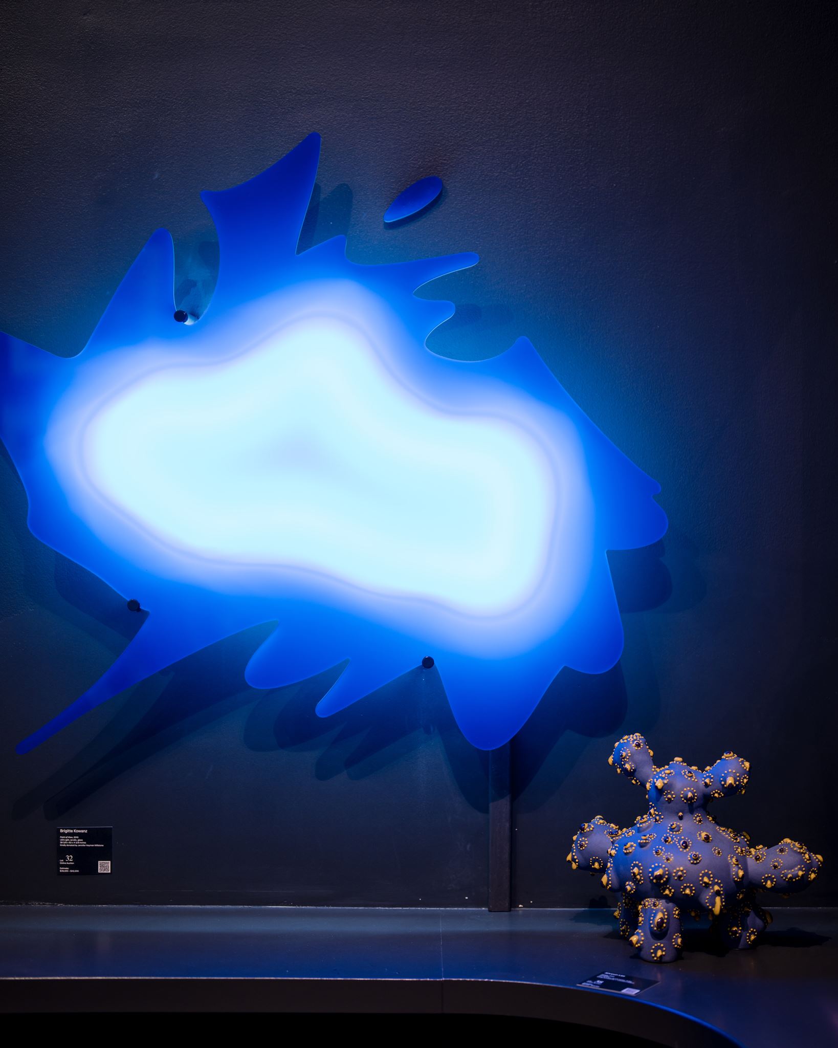 Installed artwork photographed at an Aspen Art Museum opening under mixed gallery and daylight
